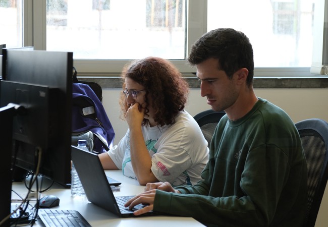 Premium Minders looking happy and focused working on the project