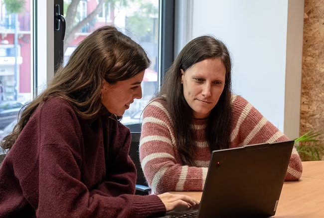 Premium Minders looking happy and focused working on the project